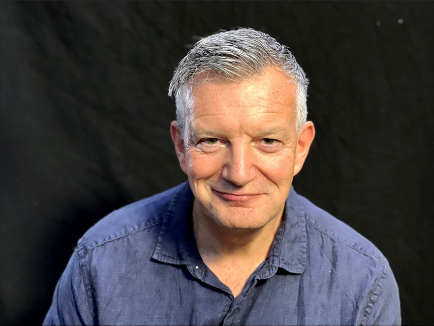 Quint Boa AI healthcare video executive producer color professional headshot